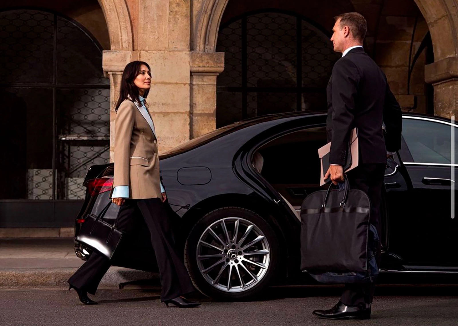 Corporate executives using luxury chauffeur service in Melbourne with VHA Limos for business travel