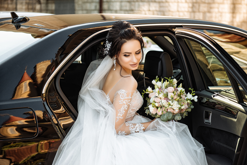 Bride arriving in luxury wedding chauffeur car in Melbourne with VHA Limos premium wedding transfer service